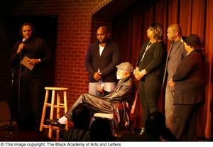 [Photograph of Curtis King standing on stage with Barbara Steele, Isabell Cottrell, Melvin Van Peebles, and others]