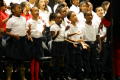 Thumbnail image of item number 1 in: '[Choir members looking at the conductor]'.