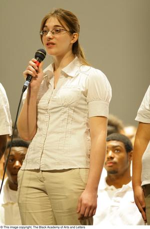 [student singer with glasses from Dallas ISD]