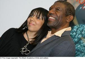 [Vondie Curtis Hall poses with woman]