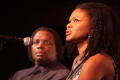 Photograph: [Curtis King watches Kimberly Elise look up]