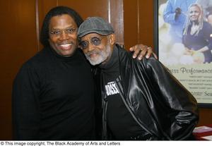 [Photograph of Curtis King posing with Melvin Van Peebles]