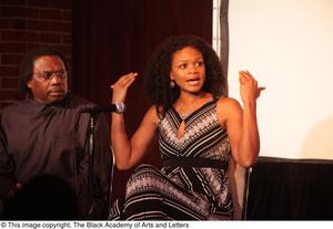 [Kimberly Elise talks to audience as Curtis King watches on]