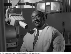 [Photograph of Dr. Strotha E. Hardeman, Jr. and his dental equipment #2]