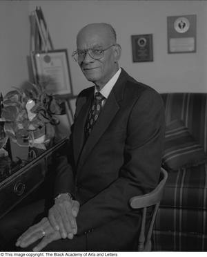 [Floyd F. Wilkerson seated for his portrait #3]