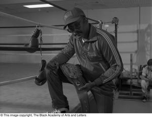 [Photograph of Curtis Cokes and his WBC belt]