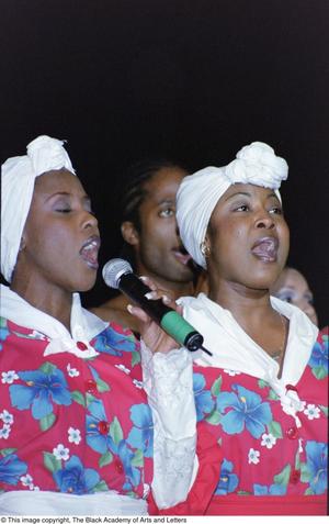 [Singers performing at the Ashe Caribbean event]