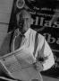Photograph: [Samuel Wick holding The Dallas Post Tribune #2]
