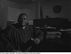 [Judge L. Clifford Davis photographed in his courtroom]