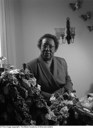 [Althea Jones Hillard photographed with her quilting project #2]