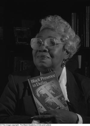 [Photograph of Sadye Gee and her book]