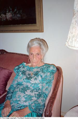 [Photograph of Pearl C. Anderson in her living room #2]