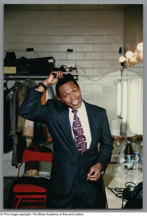 [Photograph of Ernest Thomas in dressing room]