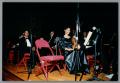 Photograph: [Photograph of some performers in the orchestra ensemble]