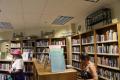 Photograph: [Susan Snyder and attendee on library tour of Stow Presbyterian Churc…
