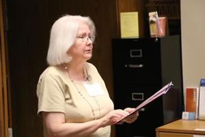 [Joyce Knight leading tour of the Stow Presbyterian Church library]