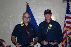 [Arlington firefighters Joel B. Lopez and Kevin S. Pittmon receiving award]