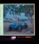 Thumbnail image of item number 1 in: '[Photograph of a dune buggy parked at Green Valley Raceway]'.