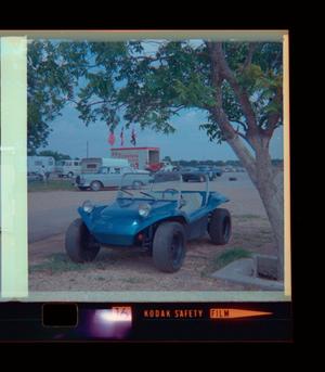 [Photograph of a dune buggy parked at Green Valley Raceway]