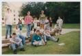 Photograph: [Photograph of TAMS students on campus walkway]