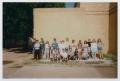 Photograph: [Photograph of TAMS group posing on campus]