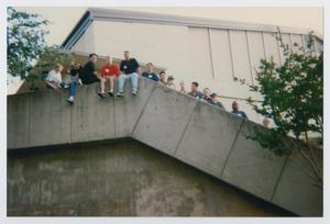 [Photograph of TAMS students near stairs]