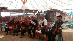 Dancers and elders at the first death anniversary of late Behon Shilshi at Deering Khu