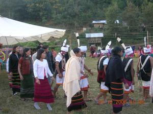Lamkang Traditonal Dancers dancing with the community participation-elderly women to demonstrate the steps