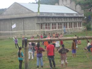 Photograph of the youth playing volley ball during the 10 days Peace Building theater workshop at Thamlapokpi