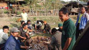 Lamkang community meat cutting by men during the first death anniversary of late Behon Shilshi at Deering Khu village