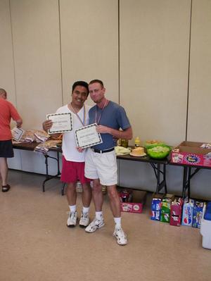 [Fred Baptista and Mark Rollins with certificates]