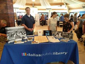 [Workers at Dallas Public Library table]