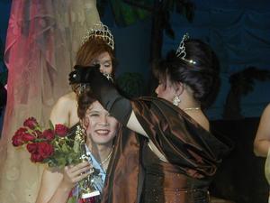 [Miss Dragonfly winner during crowning]