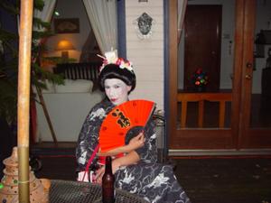 [Party attendee in geisha costume]