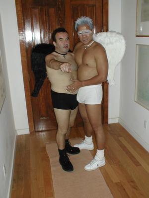 [Halloween costume pair in entrance]