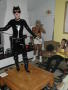 Photograph: [Guest dressed as Cat Woman performing]