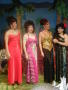 Photograph: [Four Dragonfly contestants standing on stage]