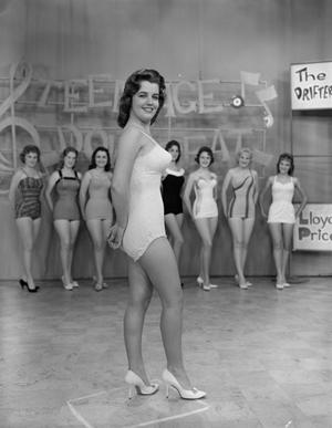 [Woman in a swimsuit posing on the set of Teen-Age Downbeat]