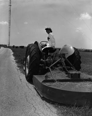 [Freda on a tractor]