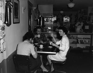 [Women in a diner]