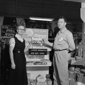 [Man and woman standing in front of a store display at Lander Mercantile 1 of 2]