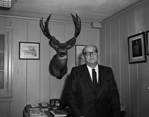 [Man with mounted deer]