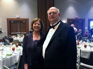 [Meredith and John Anderson at President General's Banquet]