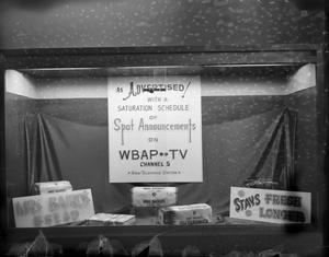 Primary view of object titled '[Photograph of Mrs. Baird's Bread window display]'.