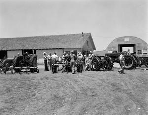 [Photograph of tractors]