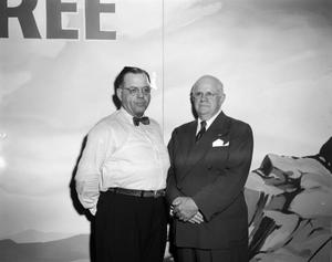 [Photograph of two men posing together]