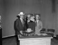 Photograph: [Photograph of Bobby Peters and $1500 Stetson hat]