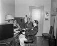 Photograph: [Merl Hartung in an office]