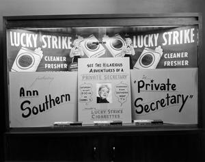 [Photo of Lucky Strike Cigarettes window display]