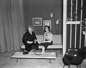 [Photo of Margaret McDonald and a female guest]